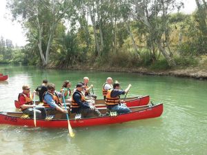 Enjoying the recreational value that a clean stretch of the Jordan River can offer